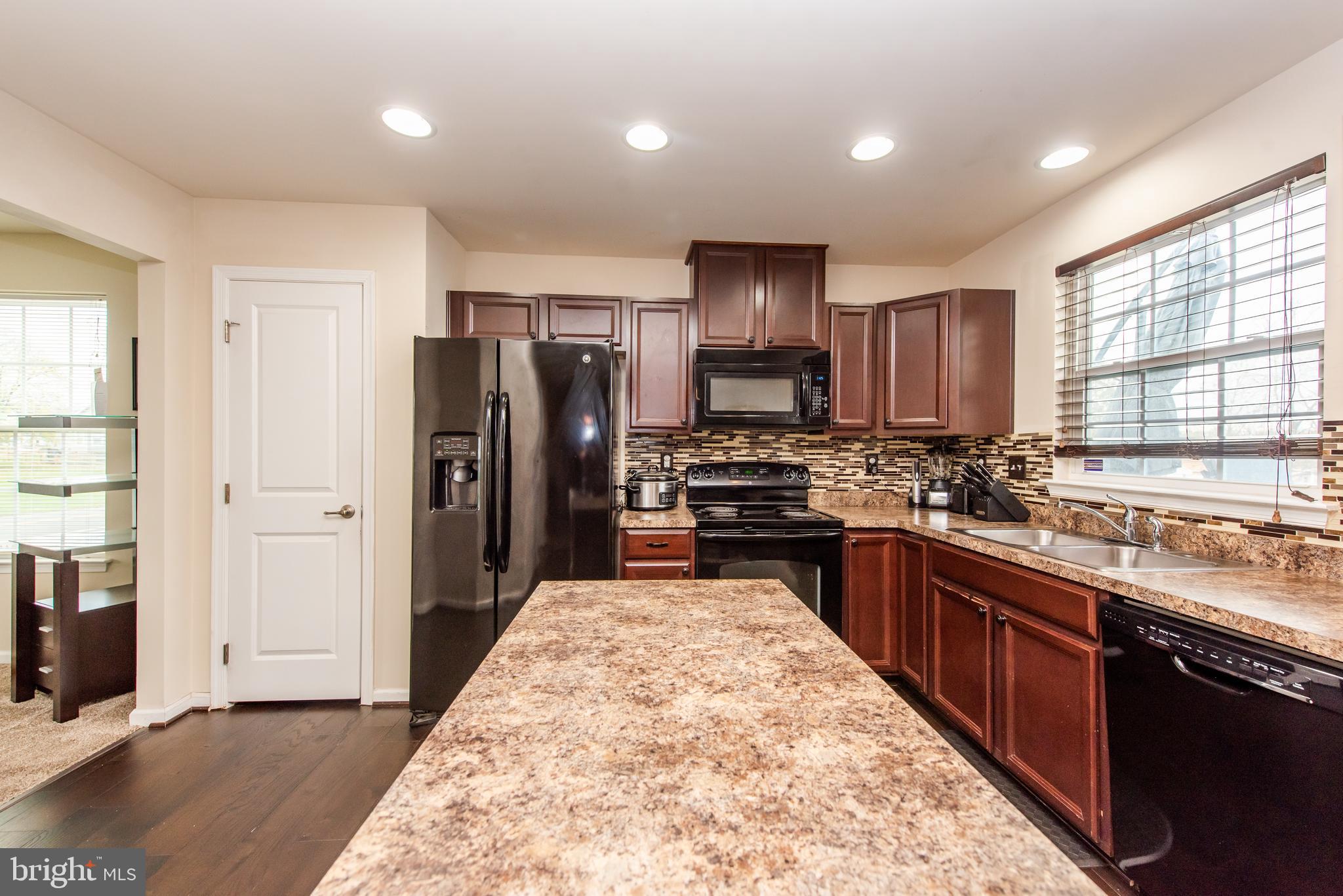 7344 Windsor Mill Road Windsor Mill, MD 21244 - Photo 12 of 45 Kitchen and entrance into Dining Room