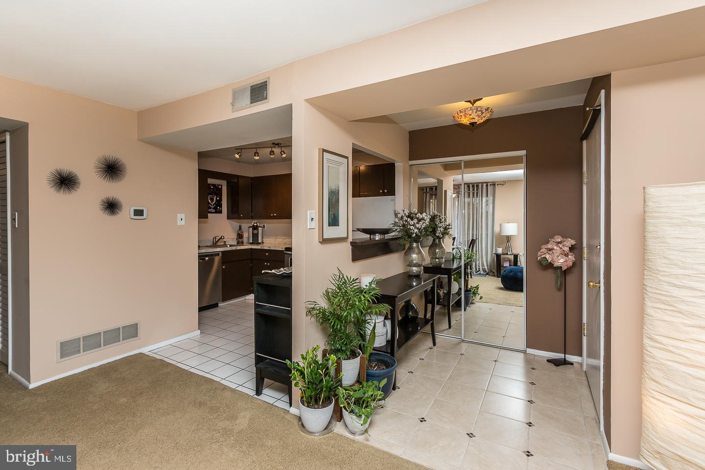 700 Putnam Boulevard, Unit 1B Wallingford, PA 19086 - Photo 8 of 26 View of Kitchen and Entrance way from Dining area