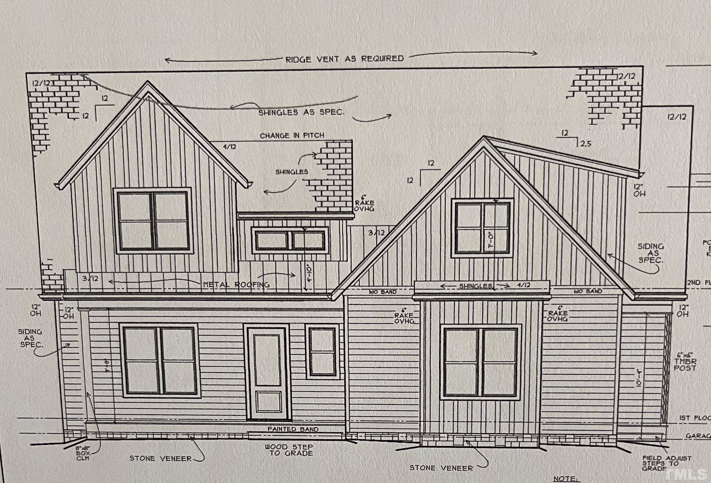 a white building with a window and balcony