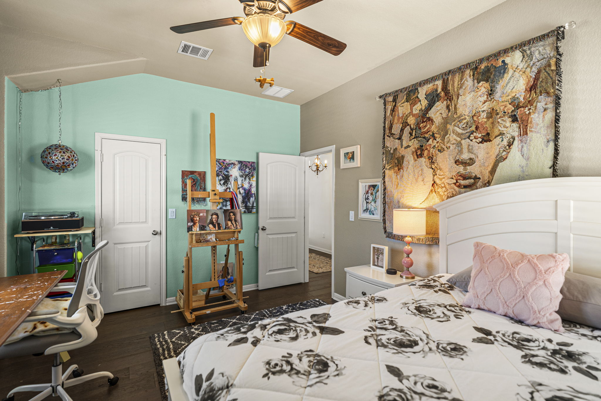 11412 Reading Way Austin, TX 78717 - Photo 18 of 35 a bedroom that has a bed and a chair in it