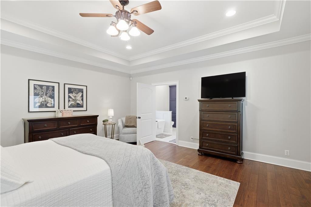 310 Gaines Road Southeast Dalton, GA 30721 - Photo 21 of 53 a bedroom with a bed and a flat screen tv