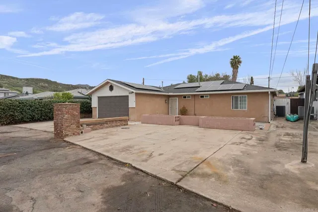 a view of a house with a patio