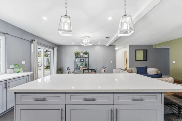 a view of living room kitchen and center island