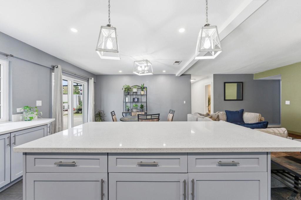 10019 Tamil Road Lakeside, CA 92040 - Photo 3 of 22 a view of living room kitchen and center island