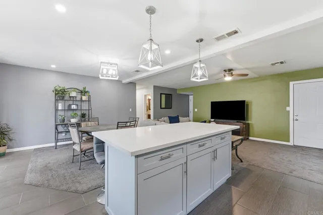 a view of a dining room kitchen and a window