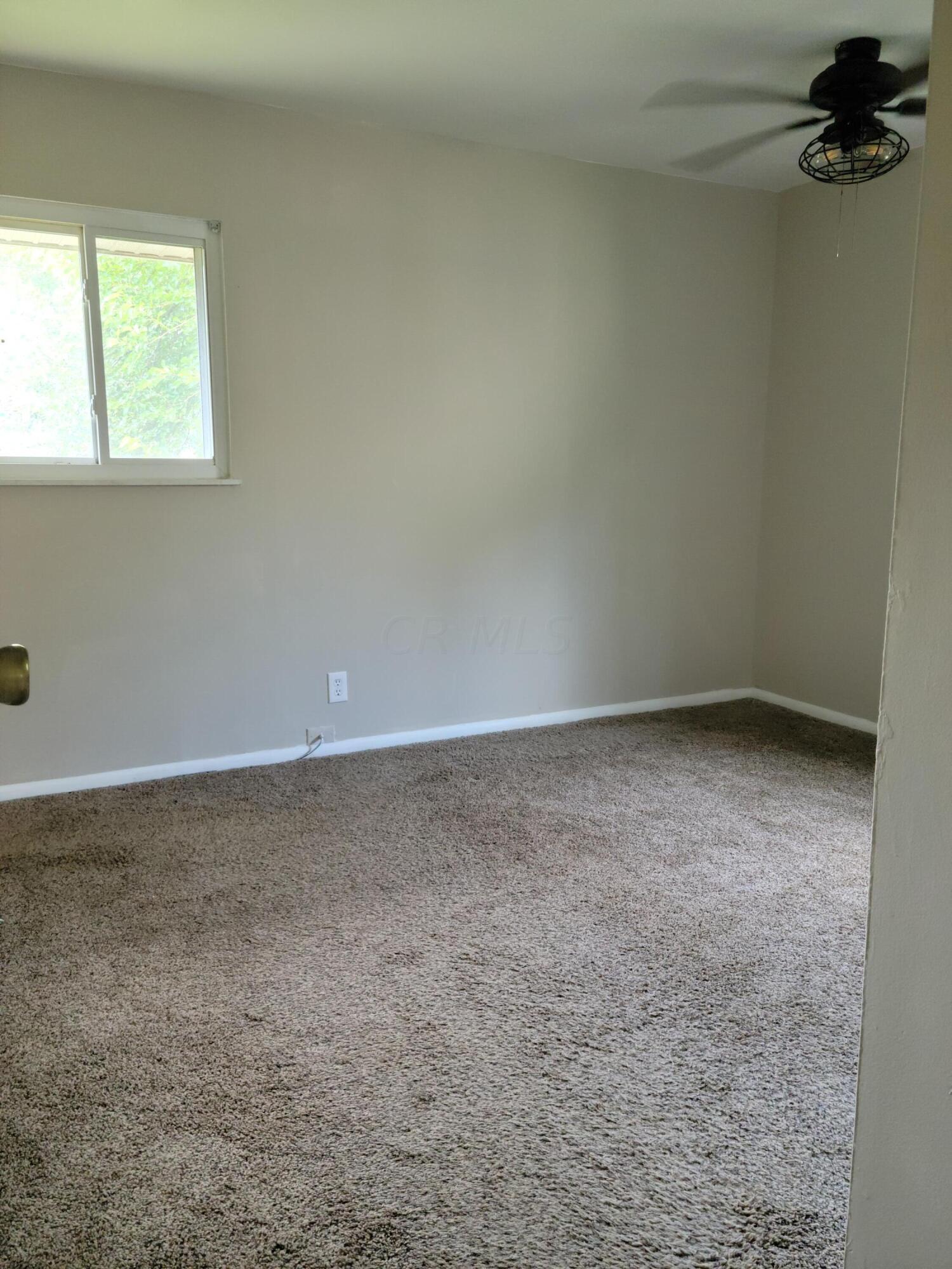 325 North Stygler Road Columbus, OH 43230 - Photo 7 of 17 Owner's bedroom with ceiling fan and freshly painted.
