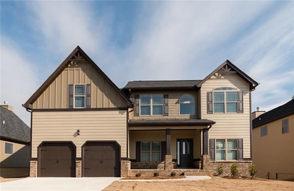 245 Ralph Still Road Dacula, GA 30019 - Photo 1 of 1 a front view of a house with a yard