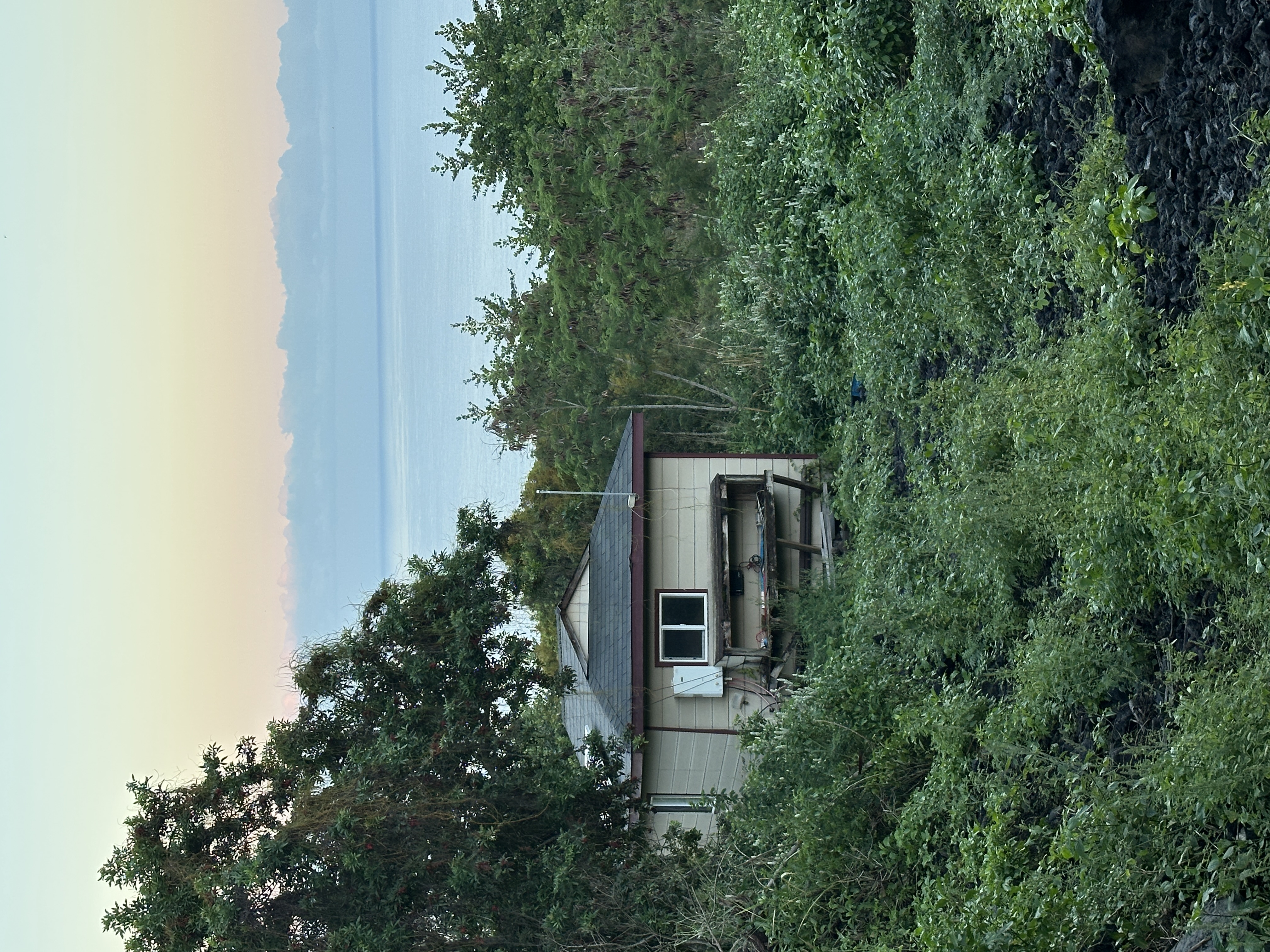 87-3143 Hawaiʻi Belt Road Captain Cook, HI 96704 - Photo 20 of 20 a view of a house with a yard
