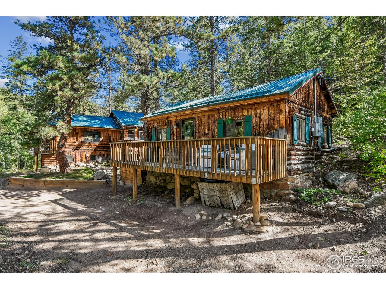 541 Riverside Drive Lyons, CO 80540 - Photo 41 of 45 Bunk House with Main cabin in the background