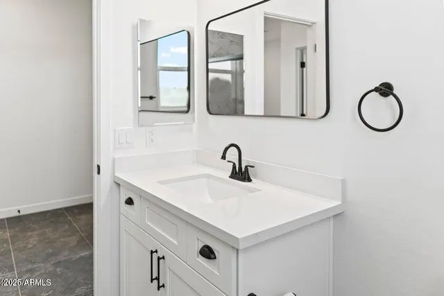 a view of a small space with a fan