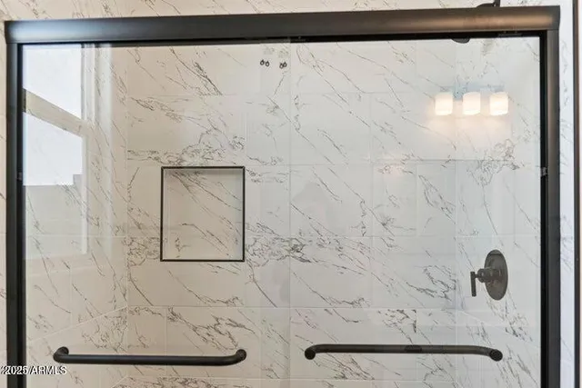 a view of small space with a white wall