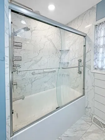 a large walk in closet and a bathroom