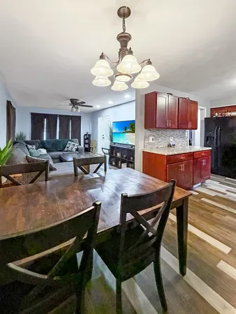 a view of a dining room with furniture