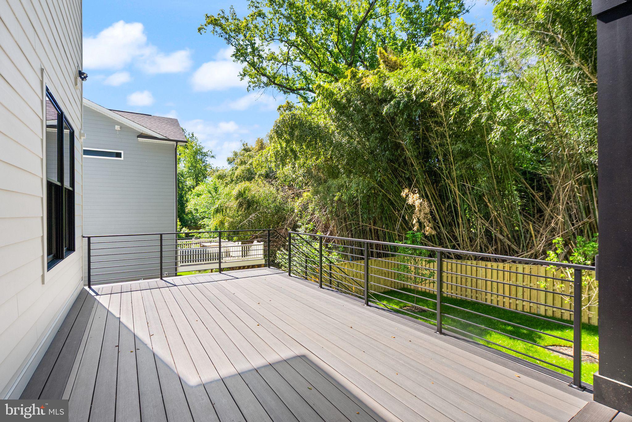 6329 Halsey Road McLean, VA 22101 - Photo 89 of 94 Serene deck with lush green backdrop.