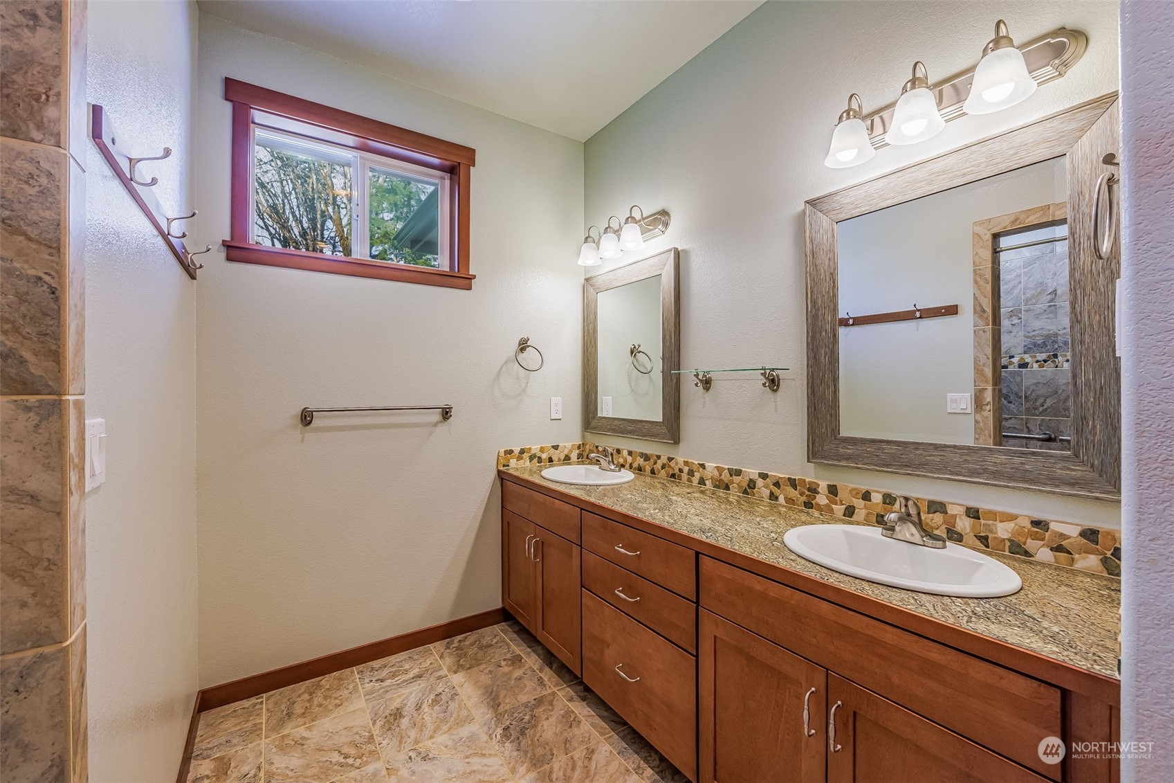 119 Marmot Loop Packwood, WA 98361 - Photo 23 of 40 a bathroom with a sink and a mirror