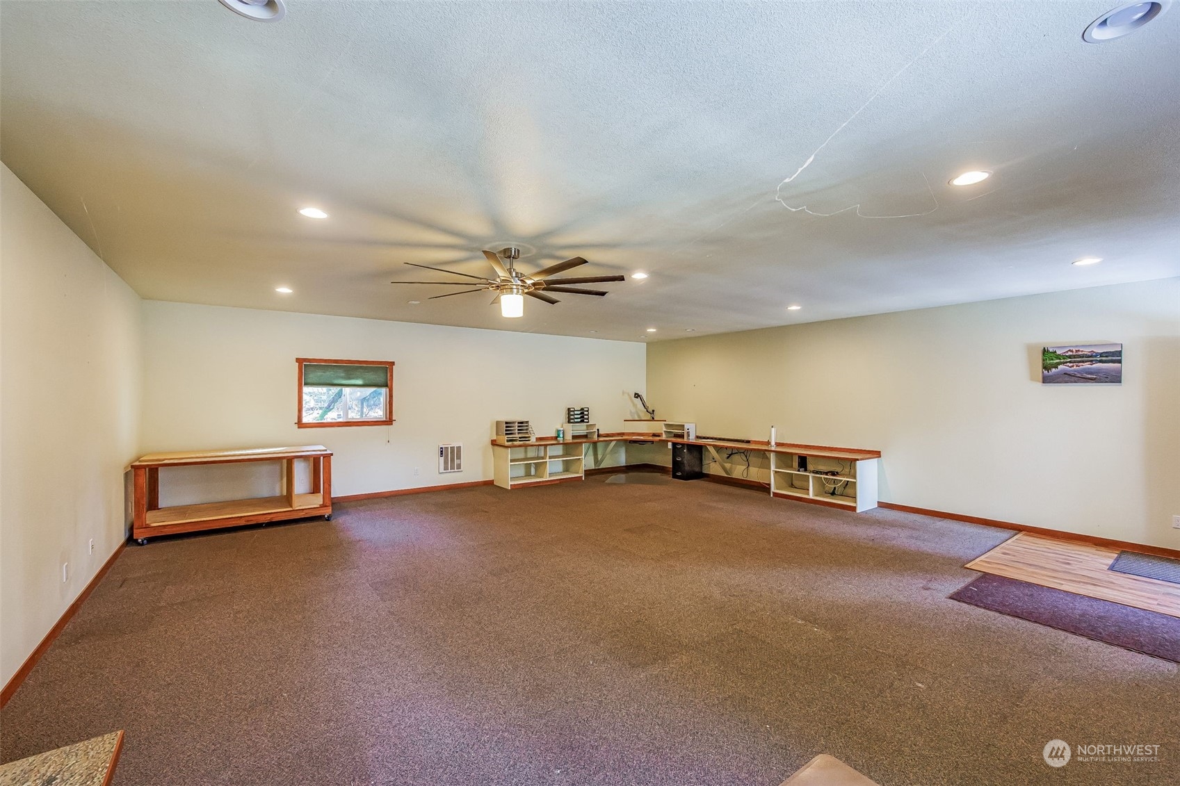 119 Marmot Loop Packwood, WA 98361 - Photo 29 of 40 an empty room with furniture and a ceiling fan
