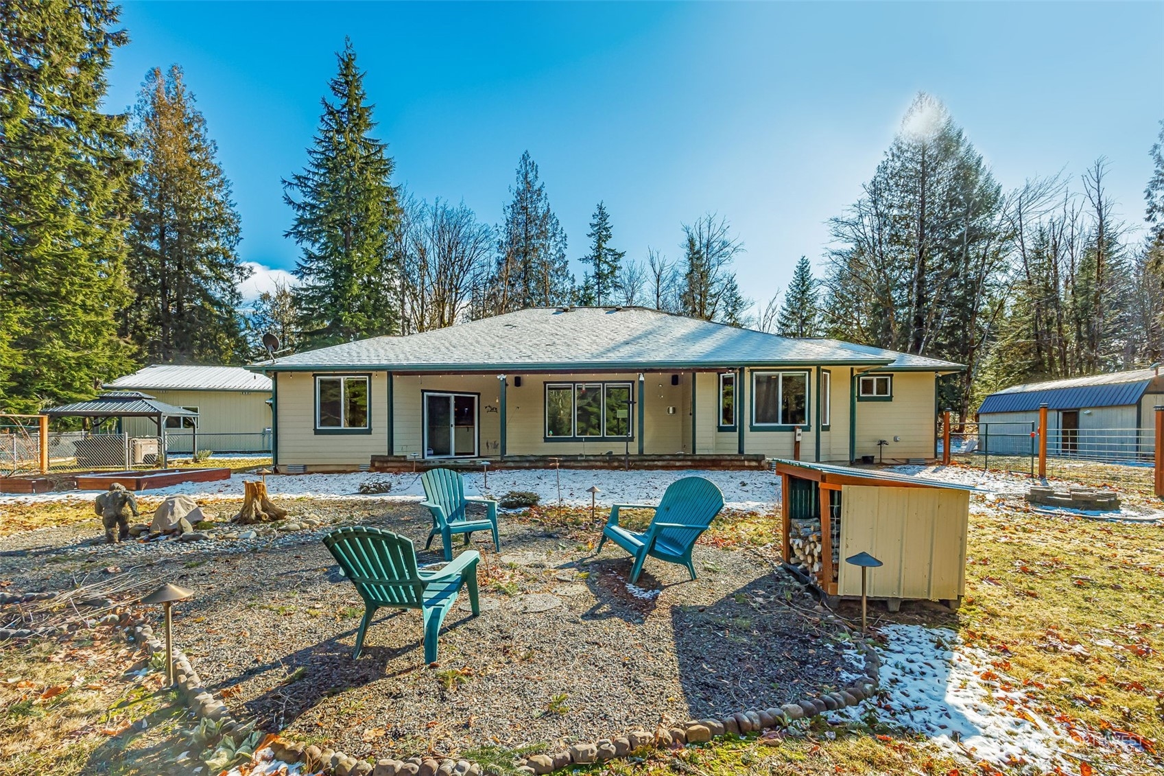 119 Marmot Loop Packwood, WA 98361 - Photo 32 of 40 a front view of a house with garden