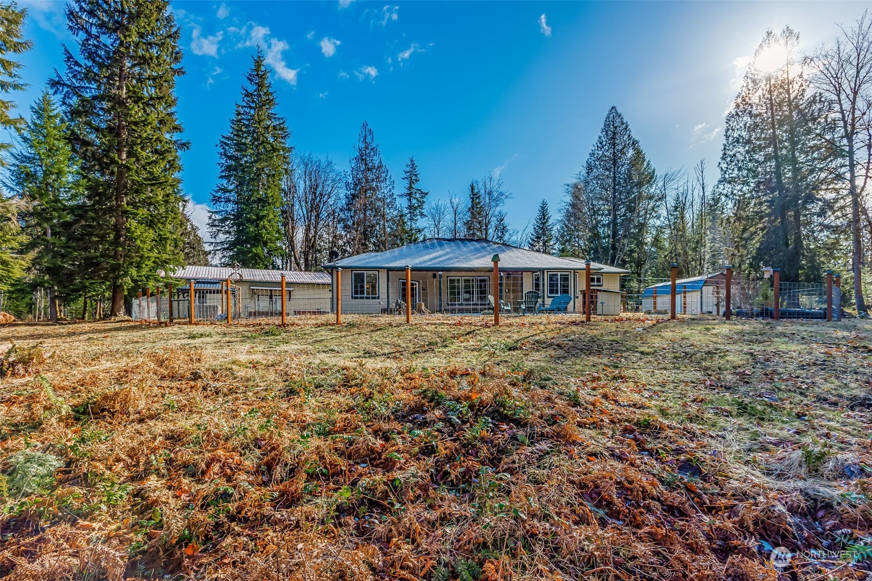 119 Marmot Loop Packwood, WA 98361 - Photo 34 of 40 a front view of a house with a yard