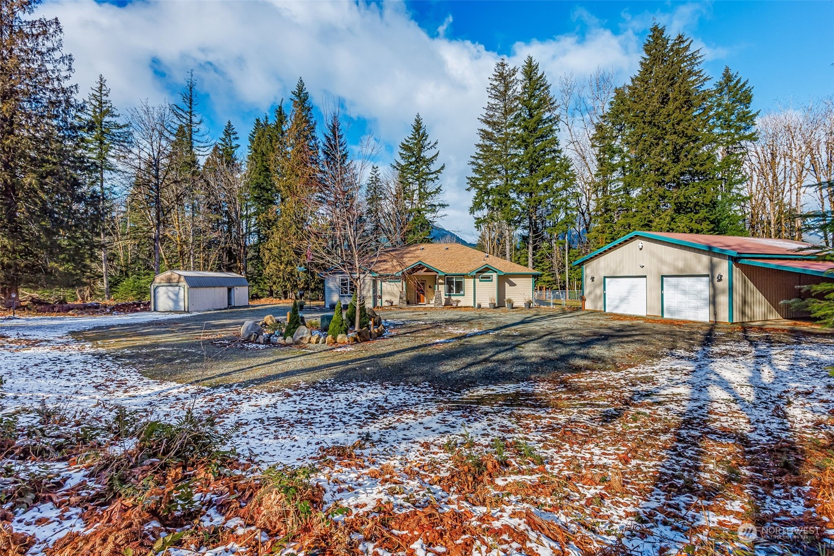 119 Marmot Loop Packwood, WA 98361 - Photo 5 of 40 a front view of a house with a yard