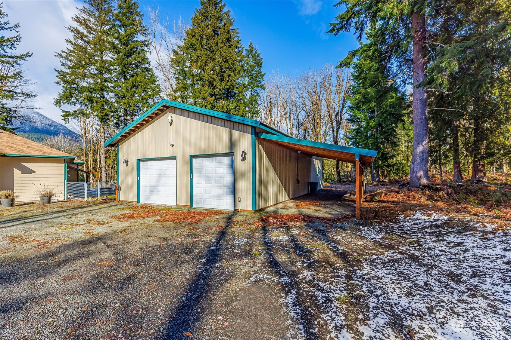 119 Marmot Loop Packwood, WA 98361 - Photo 7 of 40 a view of a house with a yard and large tree