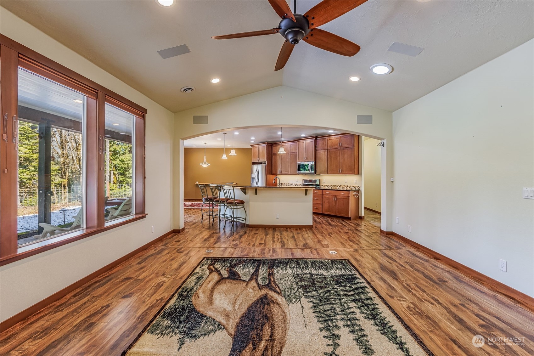 119 Marmot Loop Packwood, WA 98361 - Photo 10 of 40 a living room with a rug furniture and a wooden floor
