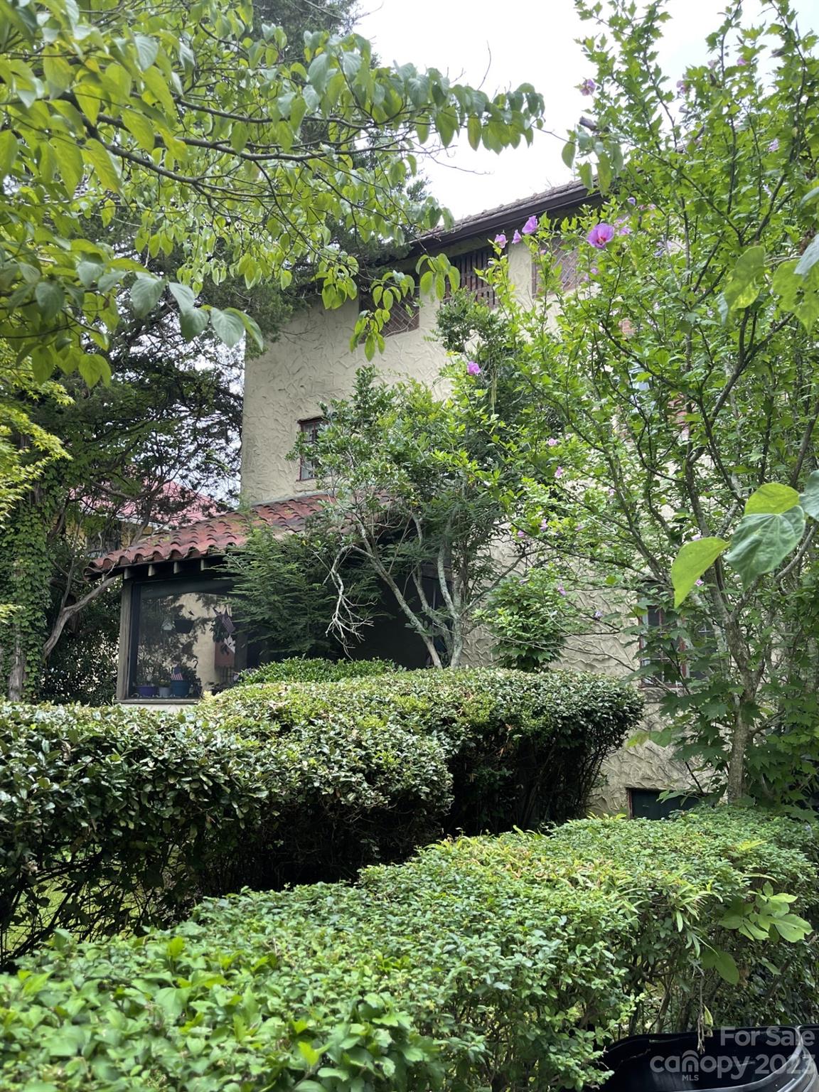 85 Melrose Avenue Tryon, NC 28782 - Photo 11 of 22 a view of a lake with a house