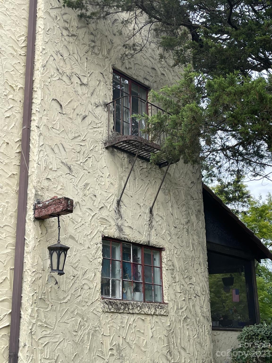 85 Melrose Avenue Tryon, NC 28782 - Photo 16 of 22 a front view of a house with chairs