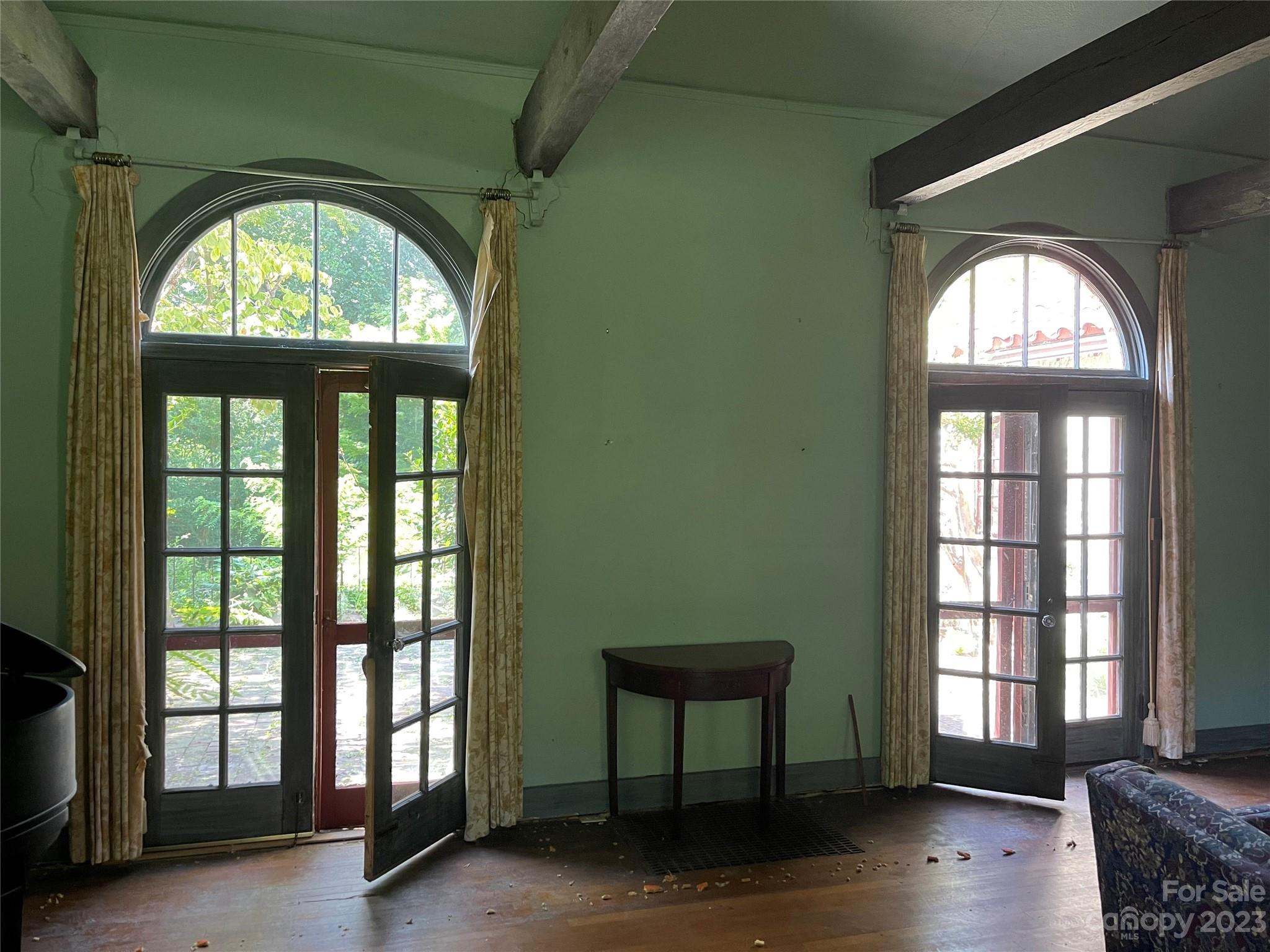 85 Melrose Avenue Tryon, NC 28782 - Photo 6 of 22 a view of front door with a mirror