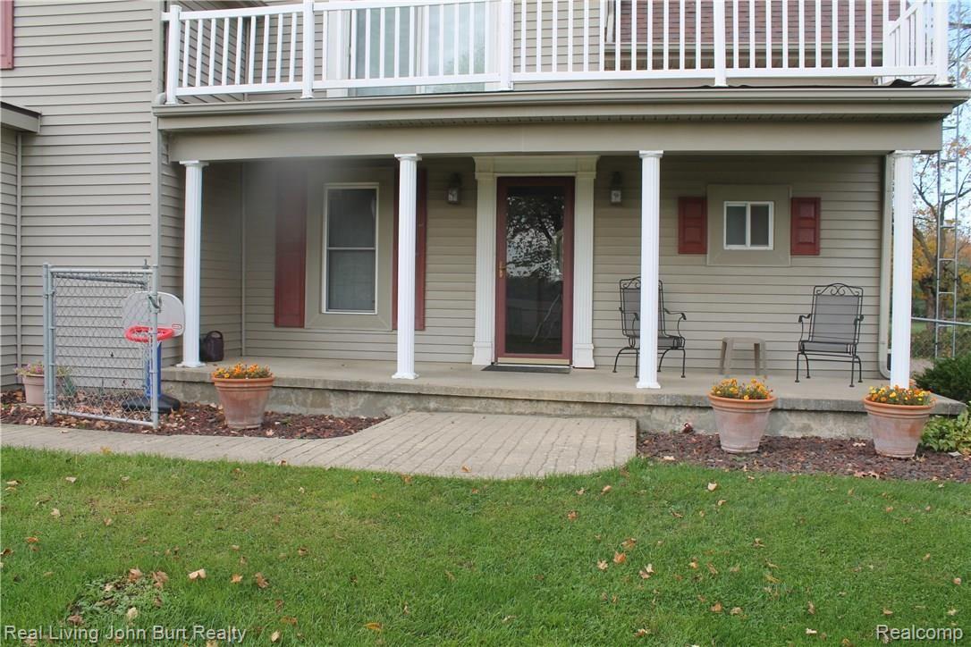 1968 Mitchell Lake Road Attica, MI 48412 - Photo 7 of 66 Upper deck lower patio.jpg