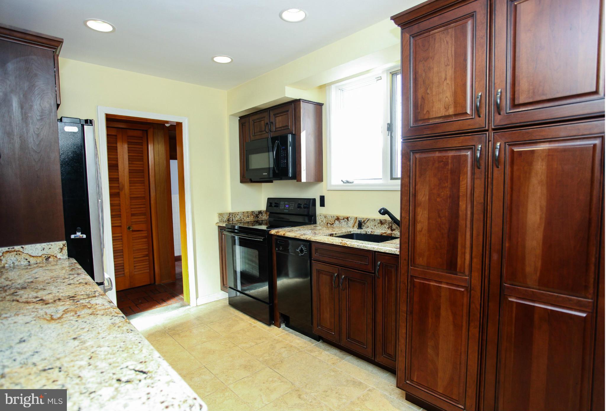 1707 Frederick Road Catonsville, MD 21228 - Photo 10 of 30 Kitchen offers granite counters & large pantry