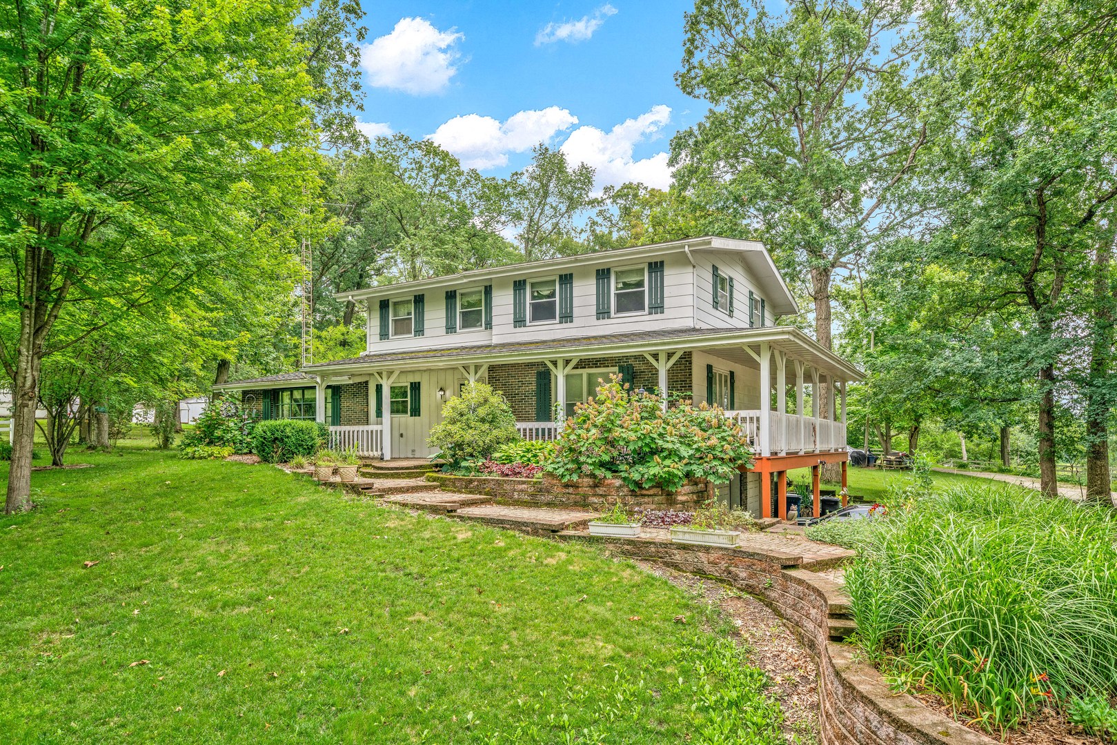 2012 North 3650th Road Serena, IL 60549 - Photo 20 of 55 a front view of a house with a yard