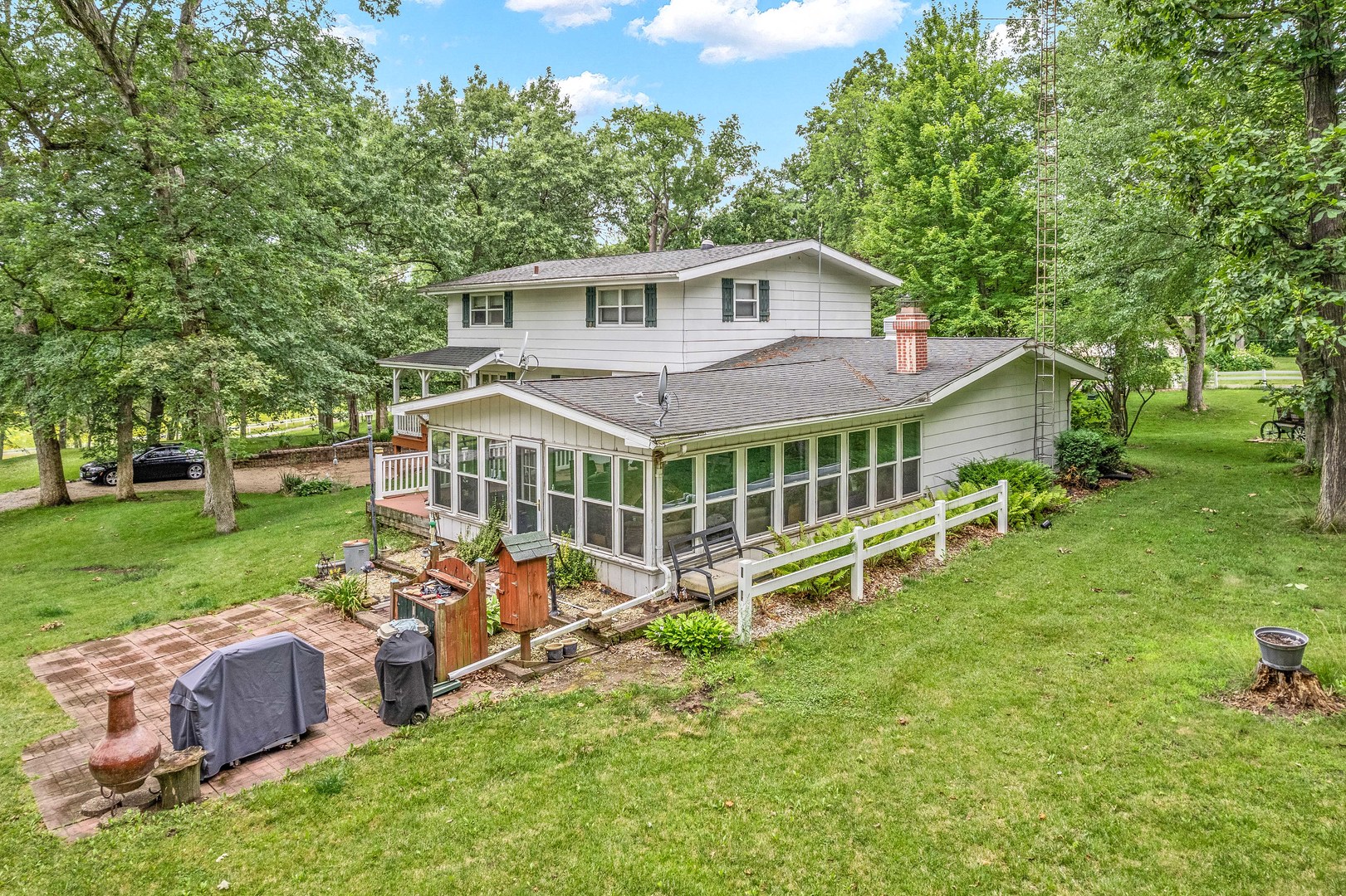 2012 North 3650th Road Serena, IL 60549 - Photo 2 of 55 a view of a house with a yard and deck