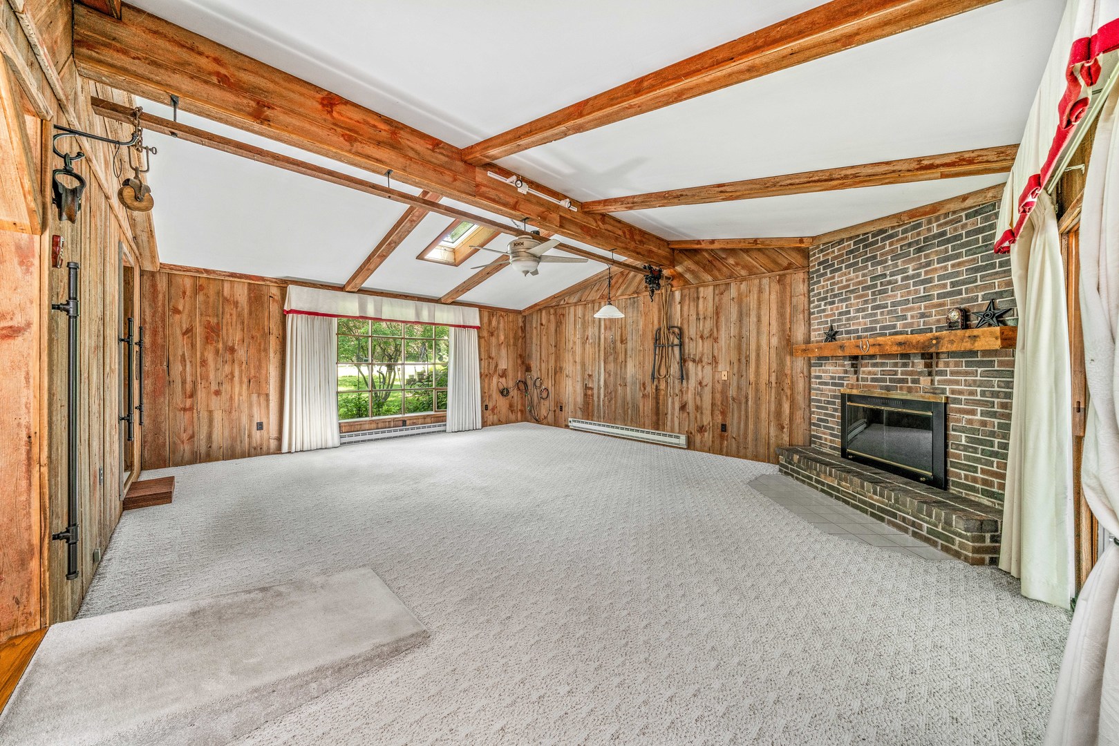 2012 North 3650th Road Serena, IL 60549 - Photo 24 of 55 a view of an empty room with a fireplace and a window