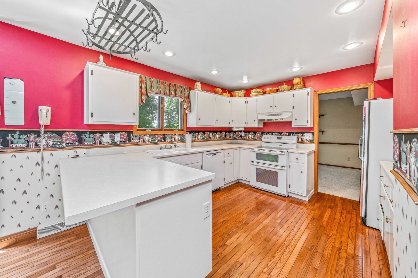2012 North 3650th Road Serena, IL 60549 - Photo 27 of 55 a kitchen with stainless steel appliances granite countertop a sink and cabinets
