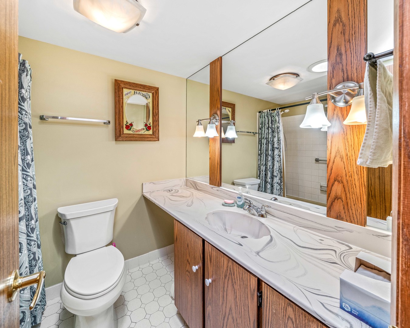 2012 North 3650th Road Serena, IL 60549 - Photo 33 of 55 a bathroom with a toilet sink and mirror