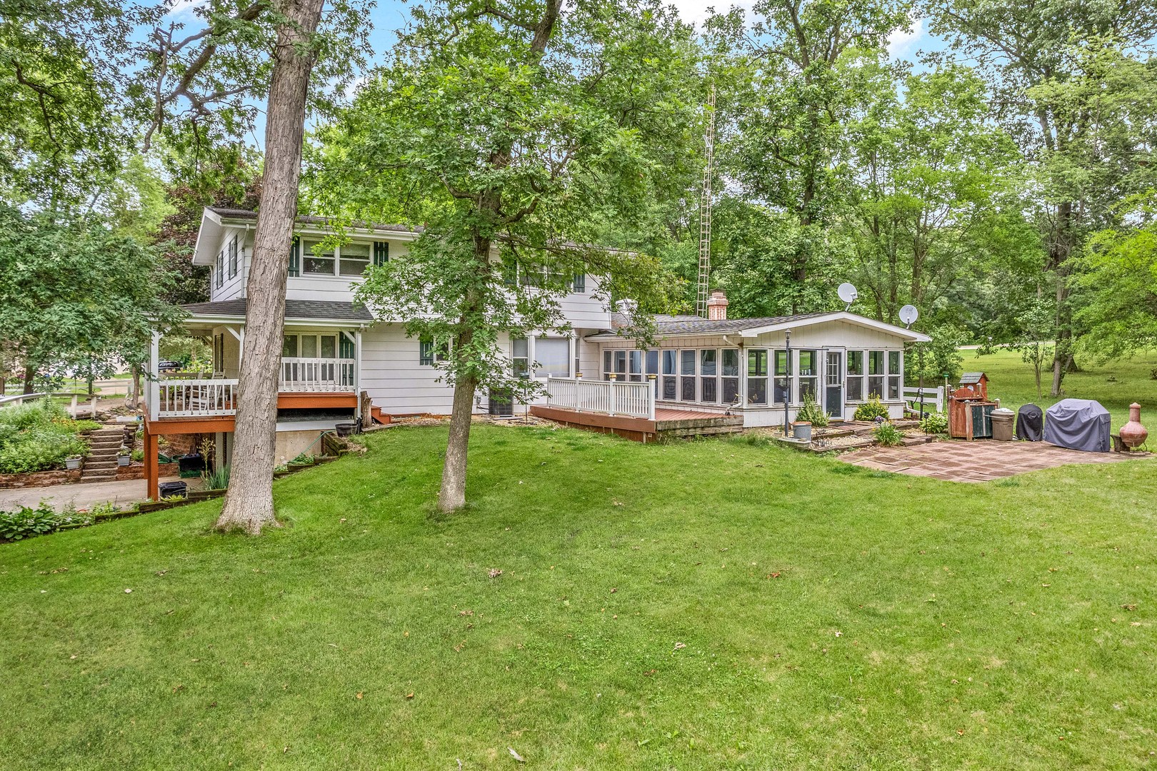 2012 North 3650th Road Serena, IL 60549 - Photo 40 of 55 a view of a house with backyard and a hammock