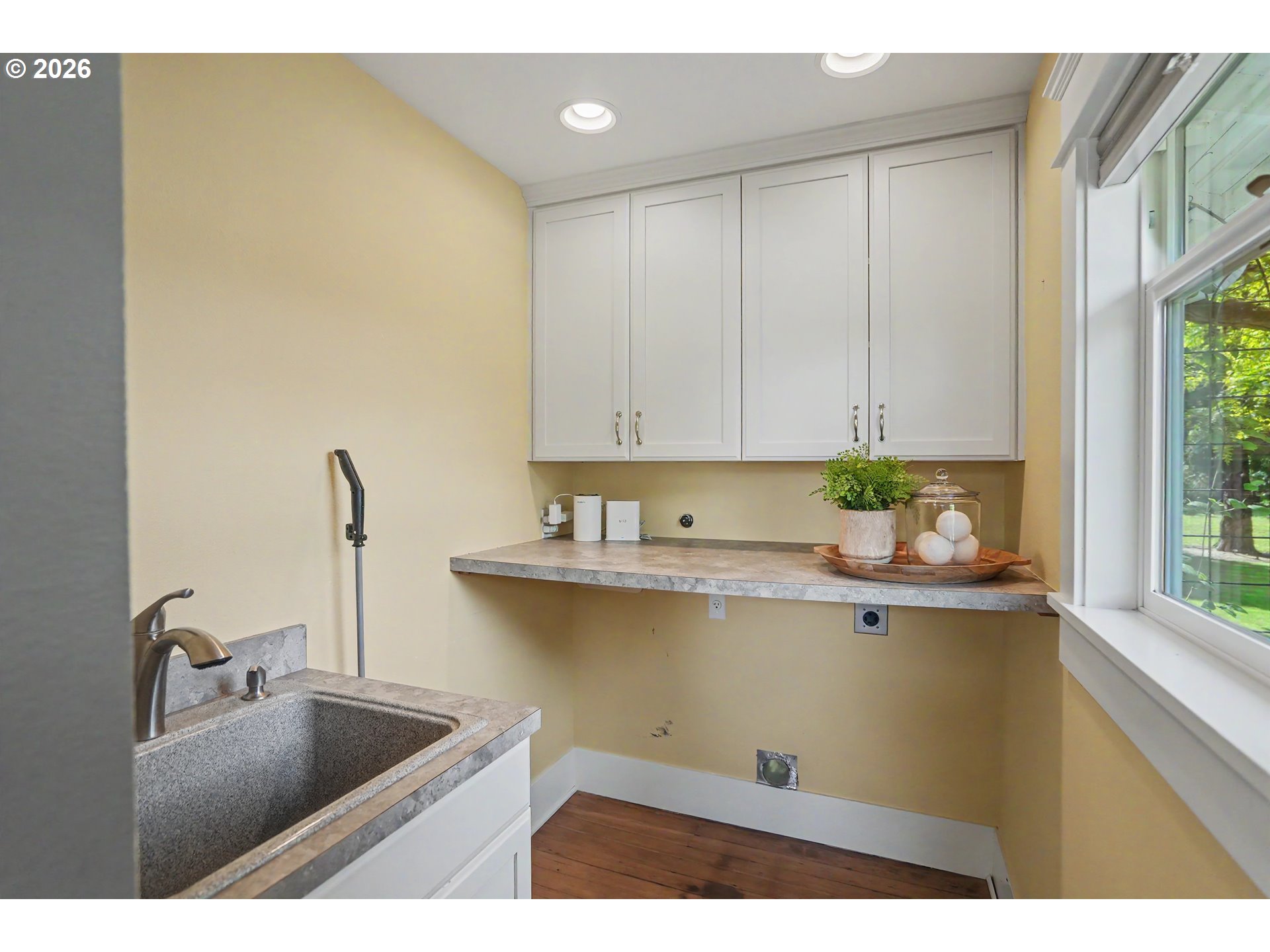 15055 Southeast Foster Road Dayton, OR 97114 - Photo 7 of 47 a kitchen with a sink and cabinets