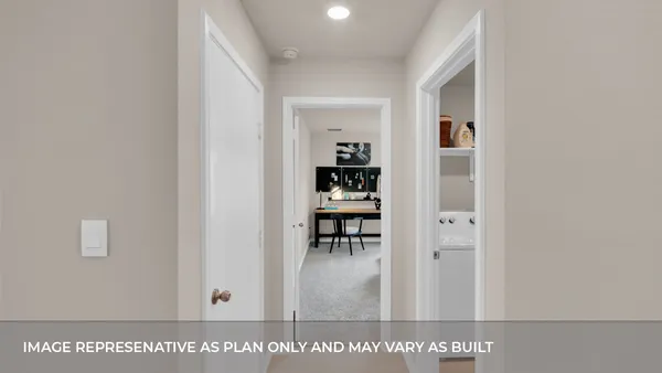 a living room with furniture a window and potted plants