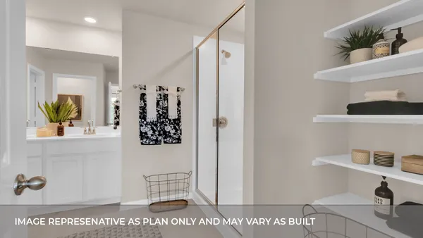 a bathroom with a sink a mirror and vanity