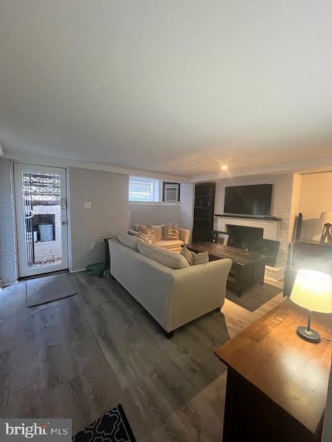 547 4th Street Southeast Washington, DC 20003 - Photo 3 of 12 a living room with furniture and a flat screen tv