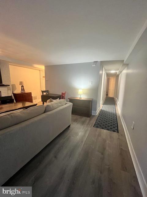 547 4th Street Southeast Washington, DC 20003 - Photo 6 of 12 a living room with furniture and a fireplace