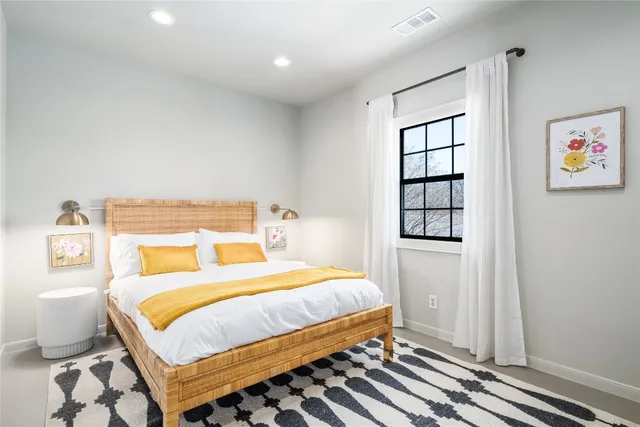 a view of a balcony with table and chairs