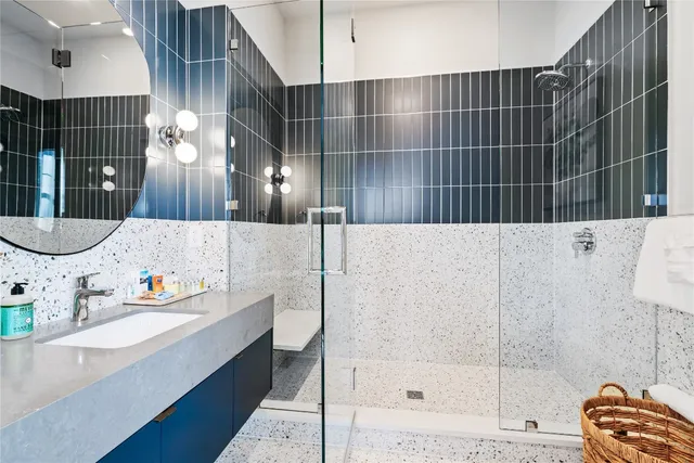 a outdoor space with pool table and chairs