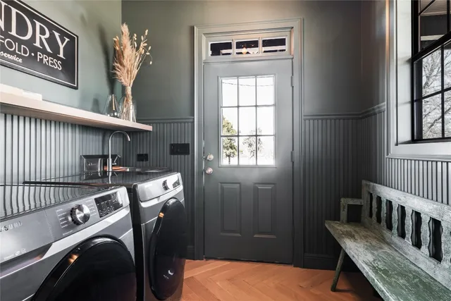 a bedroom with a bed lamp closet and window