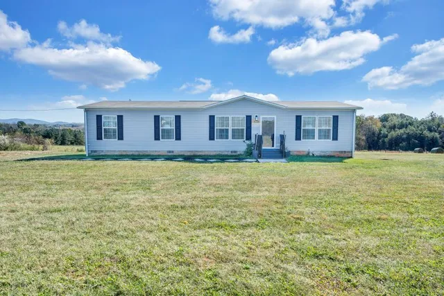 a house view with a garden space