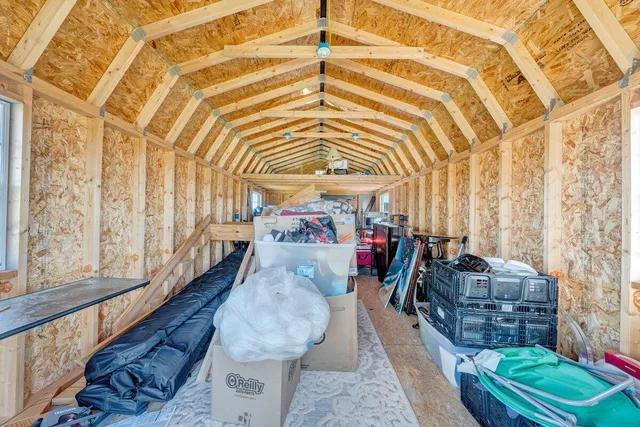 a view of a living room with furniture