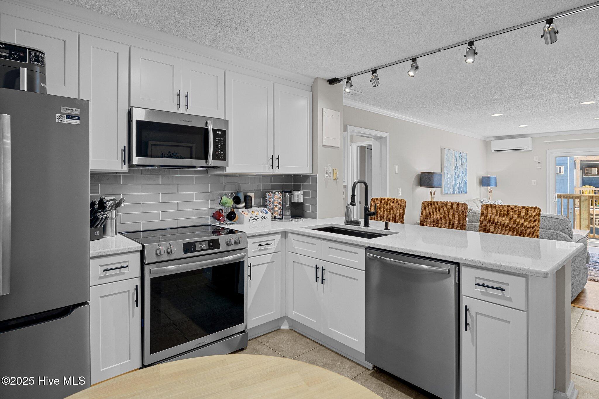 2196 New River Inlet Road, Unit 261 North Topsail Beach, NC 28460 - Photo 3 of 35 Kitchen