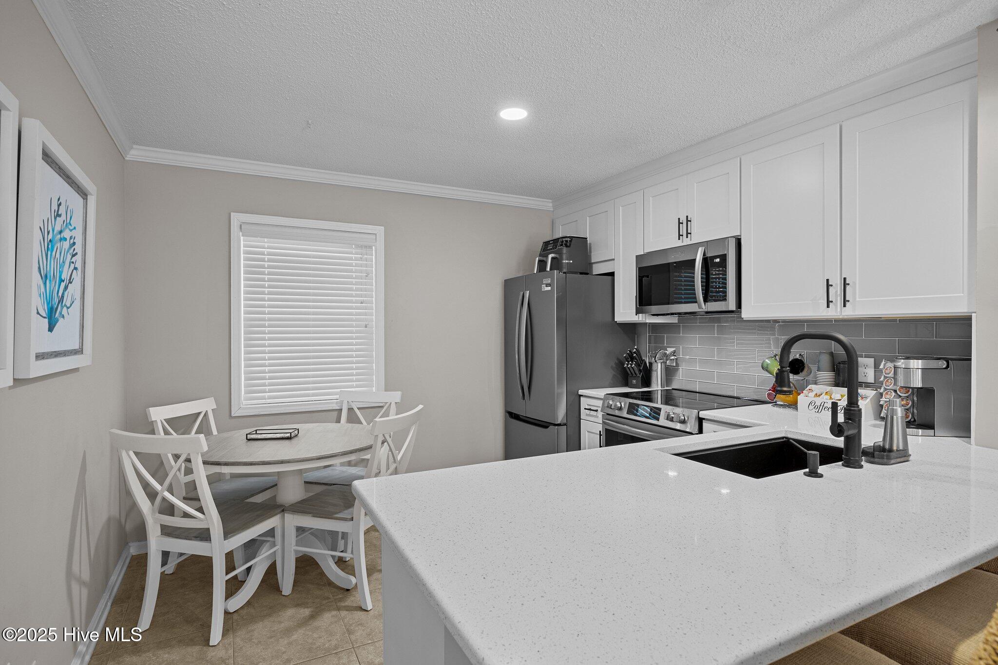 2196 New River Inlet Road, Unit 261 North Topsail Beach, NC 28460 - Photo 5 of 35 Kitchen