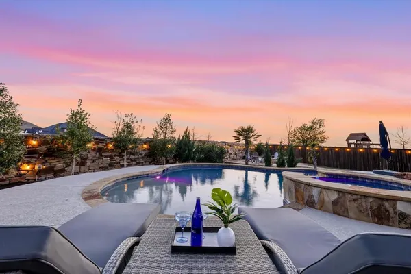 a view of a terrace with sitting area