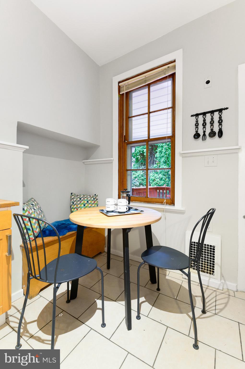 4248 Regent Square Philadelphia, PA 19104 - Photo 11 of 32 a view of a dining room with tables and chairs